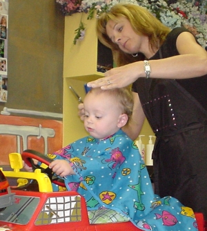 Nate getting his first haircut at Gumball Alley in Valencia on May 21, 2006.